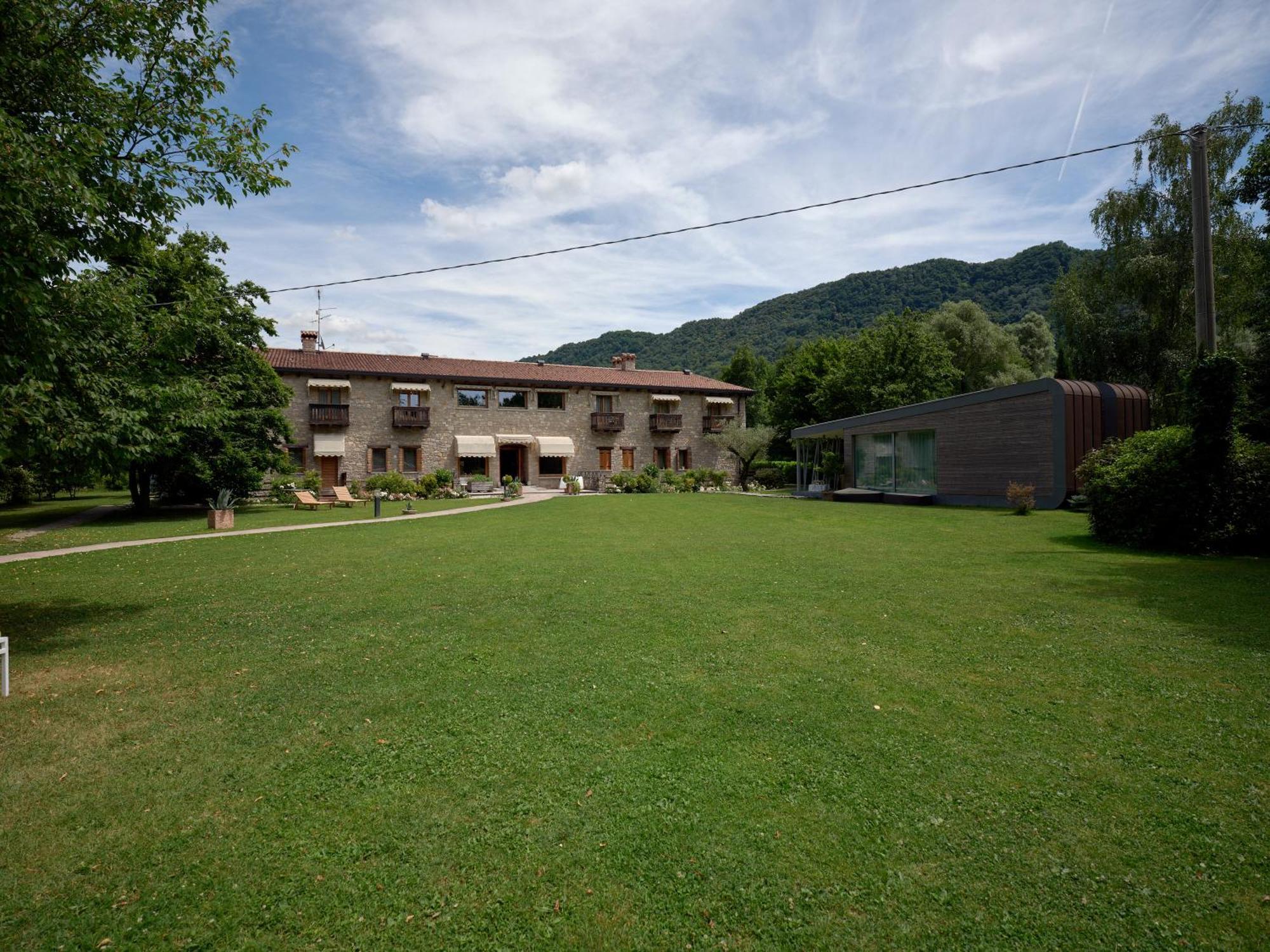 Ai Cadelach Hotel Giulia Revine Lago المظهر الخارجي الصورة